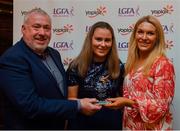 26 March 2022; Margaret Murphy of MTU Cork receives her Yoplait Rising Stars 2022 award from Deirdre Lowry, Brand Manager Yoplait Ireland, and Daniel Caldwell, Chairperson Ladies HEC, at the 2022 Yoplait HEC All Stars evening, at the Croke Park Hotel, Dublin. Photo by Ray McManus/Sportsfile