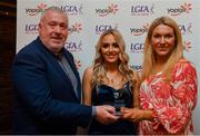 26 March 2022; Danielle McGinley of Letterkenny IT receives her Yoplait Rising Stars 2022 award from Deirdre Lowry, Brand Manager Yoplait Ireland, and Daniel Caldwell, Chairperson Ladies HEC, at the 2022 Yoplait HEC All Stars evening, at the Croke Park Hotel, Dublin. Photo by Ray McManus/Sportsfile