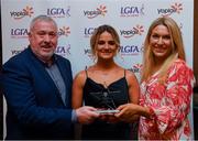 26 March 2022; Roisin Ambrose of University of Limerick receives her Yoplait HEC All Star 2022 award from Deirdre Lowry, Brand Manager Yoplait Ireland, and Daniel Caldwell, Chairperson Ladies HEC, at the 2022 Yoplait HEC All Stars evening, at the Croke Park Hotel, Dublin. Photo by Ray McManus/Sportsfile