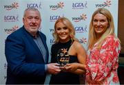 26 March 2022; Maeve Daly of MTU Cork receives her Yoplait Rising Stars 2022 award from Deirdre Lowry, Brand Manager Yoplait Ireland, and Daniel Caldwell, Chairperson Ladies HEC, at the 2022 Yoplait HEC All Stars evening, at the Croke Park Hotel, Dublin. Photo by Ray McManus/Sportsfile