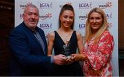 26 March 2022; Abbie O’Mahony of MTU Cork receives her Yoplait Rising Stars 2022 award from Deirdre Lowry, Brand Manager Yoplait Ireland, and Daniel Caldwell, Chairperson Ladies HEC, at the 2022 Yoplait HEC All Stars evening, at the Croke Park Hotel, Dublin. Photo by Ray McManus/Sportsfile
