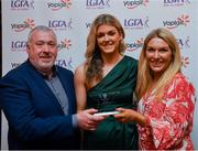 26 March 2022; Laura Brennan of Mary Immaculate College, Limerick, receives her Yoplait HEC All Star 2022 award from Deirdre Lowry, Brand Manager Yoplait Ireland, and Daniel Caldwell, Chairperson Ladies HEC, at the 2022 Yoplait HEC All Stars evening, at the Croke Park Hotel, Dublin. Photo by Ray McManus/Sportsfile
