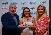 26 March 2022; Katie Long of Letterkenny IT receives her Yoplait Rising Stars 2022 award from Deirdre Lowry, Brand Manager Yoplait Ireland, and Daniel Caldwell, Chairperson Ladies HEC, at the 2022 Yoplait HEC All Stars evening, at the Croke Park Hotel, Dublin. Photo by Ray McManus/Sportsfile