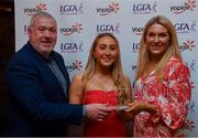 26 March 2022; Sadhbh O’Leary of University College Cork  receives her Yoplait HEC All Star 2022 award from Deirdre Lowry, Brand Manager Yoplait Ireland, and Daniel Caldwell, Chairperson Ladies HEC, at the 2022 Yoplait HEC All Stars evening, at the Croke Park Hotel, Dublin. Photo by Ray McManus/Sportsfile