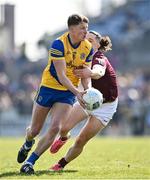 27 March 2022; Conor Cox of Roscommon in action against Kieran Molloy of Galway during the Allianz Football League Division 2 match between Roscommon and Galway at Dr Hyde Park in Roscommon. Photo by David Fitzgerald/Sportsfile