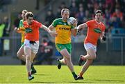 27 March 2022; Michael Murphy of Donegal in action against Andrew Murnin and Aaron McKay of Armagh  during the Allianz Football League Division 1 match between Donegal and Armagh at O'Donnell Park in Letterkenny, Donegal. Photo by Oliver McVeigh/Sportsfile