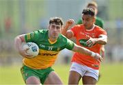 27 March 2022; Patrick McBrearty of Donegal in action against Jemar Hall of Armagh during the Allianz Football League Division 1 match between Donegal and Armagh at O'Donnell Park in Letterkenny, Donegal. Photo by Oliver McVeigh/Sportsfile