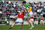 27 March 2022; Niall McNamee of Offaly is fouled by Kevin Flahive of Cork, resulting in a penalty, during the Allianz Football League Division 2 match between Offaly and Cork at Bord na Mona O'Connor Park in Tullamore, Offaly. Photo by Sam Barnes/Sportsfile