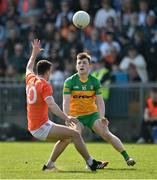 27 March 2022; Shane O'Donnell of Donegal in action against Conor O'Neill of Armagh during the Allianz Football League Division 1 match between Donegal and Armagh at O'Donnell Park in Letterkenny, Donegal. Photo by Oliver McVeigh/Sportsfile
