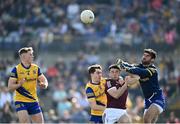 27 March 2022; Roscommon goalkeeper Colm Lavin and David Murray in action against Dessie Conneely of Galway during the Allianz Football League Division 2 match between Roscommon and Galway at Dr Hyde Park in Roscommon. Photo by David Fitzgerald/Sportsfile