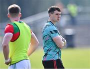 27 March 2022; Paddy Durcan of Mayo watches his teammates in the warm-up before the Allianz Football League Division 1 match between Mayo and Kildare at Avant Money Páirc Seán Mac Diarmada in Carrick-on-Shannon, Leitrim. Photo by Piaras Ó Mídheach/Sportsfile