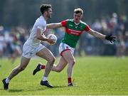 27 March 2022; Kevin Flynn of Kildare in action against Matthew Ruane of Mayo during the Allianz Football League Division 1 match between Mayo and Kildare at Avant Money Páirc Seán Mac Diarmada in Carrick-on-Shannon, Leitrim. Photo by Piaras Ó Mídheach/Sportsfile