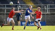 27 March 2022; Kevin Quinn of Wicklow in action against Bevan Duffy and Leonard Gray of Louth during the Allianz Football League Division 3 match between Wicklow and Louth at County Grounds in Aughrim, Wicklow. Photo by Matt Browne/Sportsfile