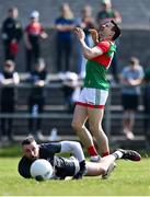 27 March 2022; Jason Doherty of Mayo reacts after kicking a first half goal chance wide, as Kildare goalkeeper Mark Donnellan looks on, during the Allianz Football League Division 1 match between Mayo and Kildare at Avant Money Páirc Seán Mac Diarmada in Carrick-on-Shannon, Leitrim. Photo by Piaras Ó Mídheach/Sportsfile