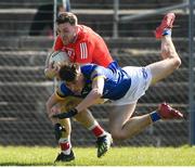 27 March 2022; Sam Mulroy of Louth in action against Patrick O'Keane of Wicklow during the Allianz Football League Division 3 match between Wicklow and Louth at County Grounds in Aughrim, Wicklow. Photo by Matt Browne/Sportsfile