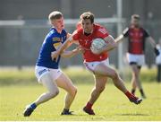 27 March 2022; Bevan Duffy of Louth in action against Kevin Quinn of Wicklow during the Allianz Football League Division 3 match between Wicklow and Louth at County Grounds in Aughrim, Wicklow. Photo by Matt Browne/Sportsfile