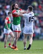 27 March 2022; Pádraig O'Hora of Mayo and Jimmy Hyland of Kildare tussle during the Allianz Football League Division 1 match between Mayo and Kildare at Avant Money Páirc Seán Mac Diarmada in Carrick-on-Shannon, Leitrim. Photo by Piaras Ó Mídheach/Sportsfile