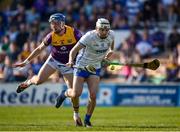 27 March 2022; Dessie Hutchinson of Waterford in action against Kevin Foley of Wexford during the Allianz Hurling League Division 1 Semi-Final match between Wexford and Waterford at UPMC Nowlan Park in Kilkenny. Photo by Daire Brennan/Sportsfile