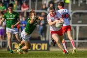27 March 2022; Emmett Bradley of Derry in action against Ronan Jones of Meath during the Allianz Football League Division 2 match between Meath and Derry at Páirc Táilteann in Navan, Meath. Photo by Philip Fitzpatrick/Sportsfile