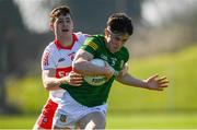 27 March 2022; Eoin Harkin of Meath in action against Padraig McGrogan of Derry during the Allianz Football League Division 2 match between Meath and Derry at Páirc Táilteann in Navan, Meath. Photo by Philip Fitzpatrick/Sportsfile