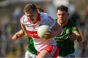 27 March 2022; Emmett Bradley of Derry in action against Donal Keogan of Meath during the Allianz Football League Division 2 match between Meath and Derry at Páirc Táilteann in Navan, Meath. Photo by Philip Fitzpatrick/Sportsfile