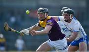 27 March 2022; Diarmuid O’Keeffe of Wexford in action against Patrick Curran of Waterford during the Allianz Hurling League Division 1 Semi-Final match between Wexford and Waterford at UPMC Nowlan Park in Kilkenny. Photo by Daire Brennan/Sportsfile