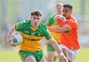 27 March 2022; Patrick McBrearty of Donegal in action against Jemar Hall  of Armagh during the Allianz Football League Division 1 match between Donegal and Armagh at O'Donnell Park in Letterkenny, Donegal. Photo by Oliver McVeigh/Sportsfile