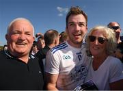 27 March 2022; Jack McCarron of Monaghan, who scored the winning point, with his mother Patricia and dad Ray after the Allianz Football League Division 1 match between Monaghan and Dublin at St Tiernach's Park in Clones, Monaghan. Photo by Ray McManus/Sportsfile