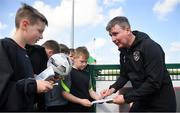 28 March 2022; Manager Stephen Kenny signs autographs for players from Mourne Celtic, Drimnagh, after a Republic of Ireland training session at FAI National Training Centre in Dublin. Photo by Eóin Noonan/Sportsfile