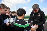 28 March 2022; Manager Stephen Kenny signs autographs for players from Mourne Celtic, Drimnagh, after a Republic of Ireland training session at FAI National Training Centre in Dublin. Photo by Eóin Noonan/Sportsfile