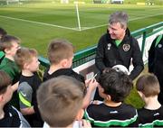28 March 2022; Manager Stephen Kenny signs autographs for players from Mourne Celtic, Drimnagh, after a Republic of Ireland training session at FAI National Training Centre in Dublin. Photo by Eóin Noonan/Sportsfile