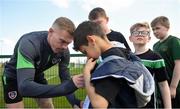 28 March 2022; James McClean signs autographs for players from Mourne Celtic, Drimnagh, after a Republic of Ireland training session at FAI National Training Centre in Dublin. Photo by Eóin Noonan/Sportsfile
