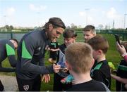 28 March 2022; Jeff Hendrick signs autographs for players from Mourne Celtic, Drimnagh, after a Republic of Ireland training session at FAI National Training Centre in Dublin. Photo by Eóin Noonan/Sportsfile