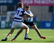 28 March 2022; Oran Richardson of St Michael's College is tackled by Johnny O'Sullivan of Blackrock College during the Bank of Ireland Leinster Rugby Schools Junior Cup Semi-Final match between Blackrock College, Dublin, and St Michael’s College, Dublin, at Energia Park in Dublin. Photo by Piaras Ó Mídheach/Sportsfile