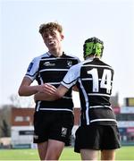 29 March 2022; Sam Cusack of Cistercian College, Roscrea, left, is congratulated by team mate Fionn Higgins after he scored their side's fourth try during the Bank of Ireland Leinster Rugby Schools Junior Cup Semi-Final match between Cistercian College, Roscrea, Tipperary and St Fintan’s High School, Dublin at Energia Park in Dublin. Photo by David Fitzgerald/Sportsfile