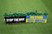 29 March 2022; Republic of Ireland players with a banner in support of Ukraine during the UEFA European U21 Championship Qualifier match between Republic of Ireland and Sweden at Borås Arena in Sweden. Photo by Jörgen Jarnberger/Sportsfile
