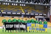 29 March 2022; Republic of Ireland players with a banner in support of Ukraine during the UEFA European U21 Championship Qualifier match between Republic of Ireland and Sweden at Borås Arena in Sweden. Photo by Mathias Bergeld/Sportsfile