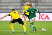29 March 2022; Joel Bagan of Republic of Ireland in action against Aiham Ousou of Sweden during the UEFA European U21 Championship Qualifier match between Republic of Ireland and Sweden at Borås Arena in Sweden. Photo by Jörgen Jarnberger/Sportsfile