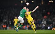 29 March 2022; John Egan of Republic of Ireland in action against Augustinas Klimavicius of Lithuania during the international friendly match between Republic of Ireland and Lithuania at the Aviva Stadium in Dublin. Photo by Ben McShane/Sportsfile