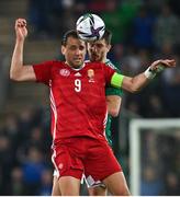 29 March 2022; Ádám Szalai of Hungary and Craig Cathcart of Northern Ireland during the international friendly match between Northern Ireland and Hungary at National Football Stadium at Windsor Park in Belfast. Photo by Ramsey Cardy/Sportsfile