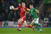 29 March 2022; Ádám Lang of Hungary and Dion Charles of Northern Ireland during the international friendly match between Northern Ireland and Hungary at National Football Stadium at Windsor Park in Belfast. Photo by Ramsey Cardy/Sportsfile