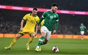 29 March 2022; Scott Hogan of Republic of Ireland in action against Rolandas Baravykas of Lithuania during the international friendly match between Republic of Ireland and Lithuania at the Aviva Stadium in Dublin. Photo by Ben McShane/Sportsfile