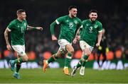 29 March 2022; Troy Parrott of Republic of Ireland, centre, celebrates after scoring his side's winning goal during the international friendly match between Republic of Ireland and Lithuania at the Aviva Stadium in Dublin. Photo by Ben McShane/Sportsfile