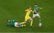 29 March 2022; Justas Lasickas of Lithuania in action against Conor Hourihane, left, and Alan Browne of Republic of Ireland during the international friendly match between Republic of Ireland and Lithuania at the Aviva Stadium in Dublin. Photo by Michael P Ryan/Sportsfile