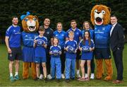30 March 2022; In attendance at the launch of Leinster Rugby Summer Camps are, backrow from left, Ray McCabe, Leinster summer camps co-ordinator, Mascot Leona the Lionness, Leinster players James Lowe, Ali Coleman, Jordan Larmour, Aoife Wafer, Mascot Leo the Lion,Rory Carty, Bank of Ireland head of youth banking, with, school children, from left, Kaleb McCallister, aged 12, Fiadh Bel Molloy, aged 9, James Mullrooney, aged 10, and Holly O'Dell, aged 11,  at St Mary's College RFC in Dublin. Photo by Sam Barnes/Sportsfile