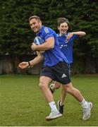 30 March 2022; In attendance at the launch of Leinster Rugby Summer Camps is Jordan Larmour of Leinster, left, with Kaleb McCallister, aged 12, at St Mary's College RFC in Dublin. Photo by Sam Barnes/Sportsfile