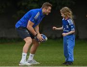 30 March 2022; In attendance at the launch of Leinster Rugby Summer Camps is Jordan Larmour of Leinster with, from left, Fiadh Bel Molloy, aged 9, at St Mary's College RFC in Dublin. Photo by Sam Barnes/Sportsfile
