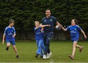 30 March 2022; In attendance at the launch of Leinster Rugby Summer Camps is James Lowe of Leinster, second from right, with, from left,  Kaleb McCallister, aged 12, James Mullrooney, aged 10, and Holly O'Dell, aged 11, at St Mary's College RFC in Dublin. Photo by Sam Barnes/Sportsfile