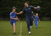 30 March 2022; In attendance at the launch of Leinster Rugby Summer Camps is James Lowe of Leinster, right, with Kaleb McCallister, aged 12, at St Mary's College RFC in Dublin. Photo by Sam Barnes/Sportsfile