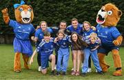 30 March 2022; In attendance at the launch of Leinster Rugby Summer Camps are, backrow from left, mascot Leona the Lioness, Leinster players Ali Coleman, James Lowe, Jordan Larmour and Aoife Wafer, and mascot Leo the Lion, with front row, from left, Kaleb McCallister, aged 12, Fiadh Bel Molloy, aged 9, Holly O'Dell, aged 11, and James Mullrooney, aged 10, at St Mary's College RFC in Dublin. Photo by Sam Barnes/Sportsfile